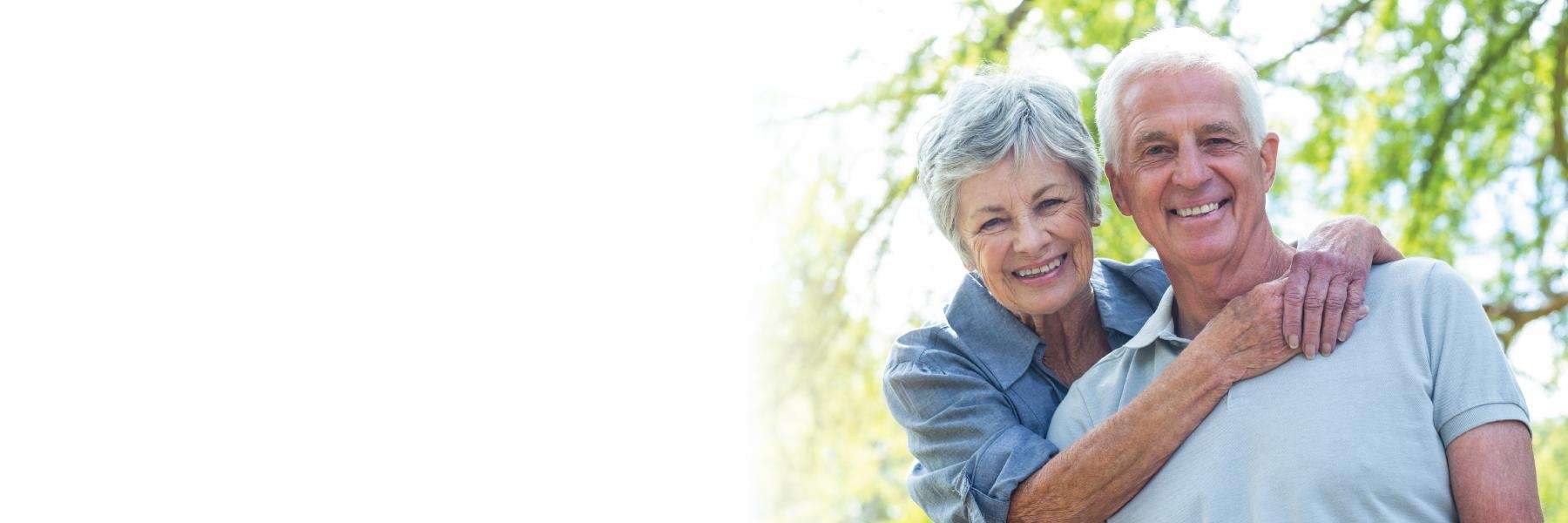 couple with dental implants for their missing tooth in lithia, FL
