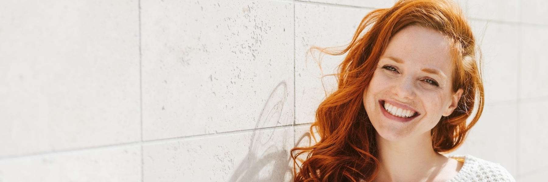 woman smiling after dental sealant treatment in lithia, FL